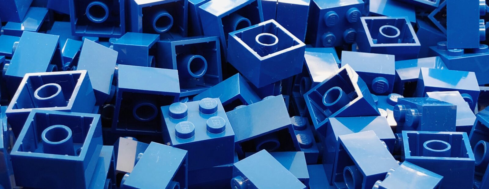 Background image of blue lego pieces