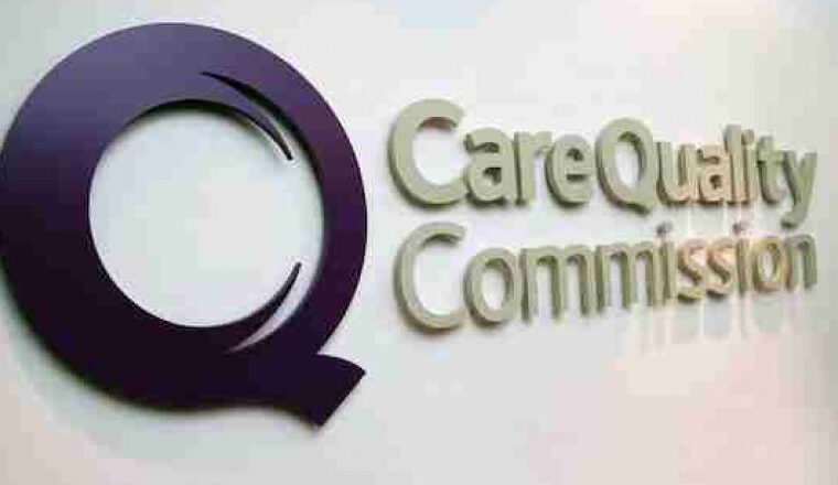 image if the CQC logo sign on a wall