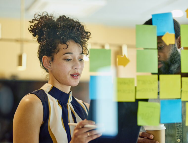 Image of a working team evaluating ideas